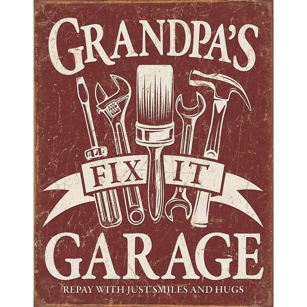 Rustic sign featuring tools like a wrench, paintbrush, and hammer with "Grandpa's Fix It Garage" text.