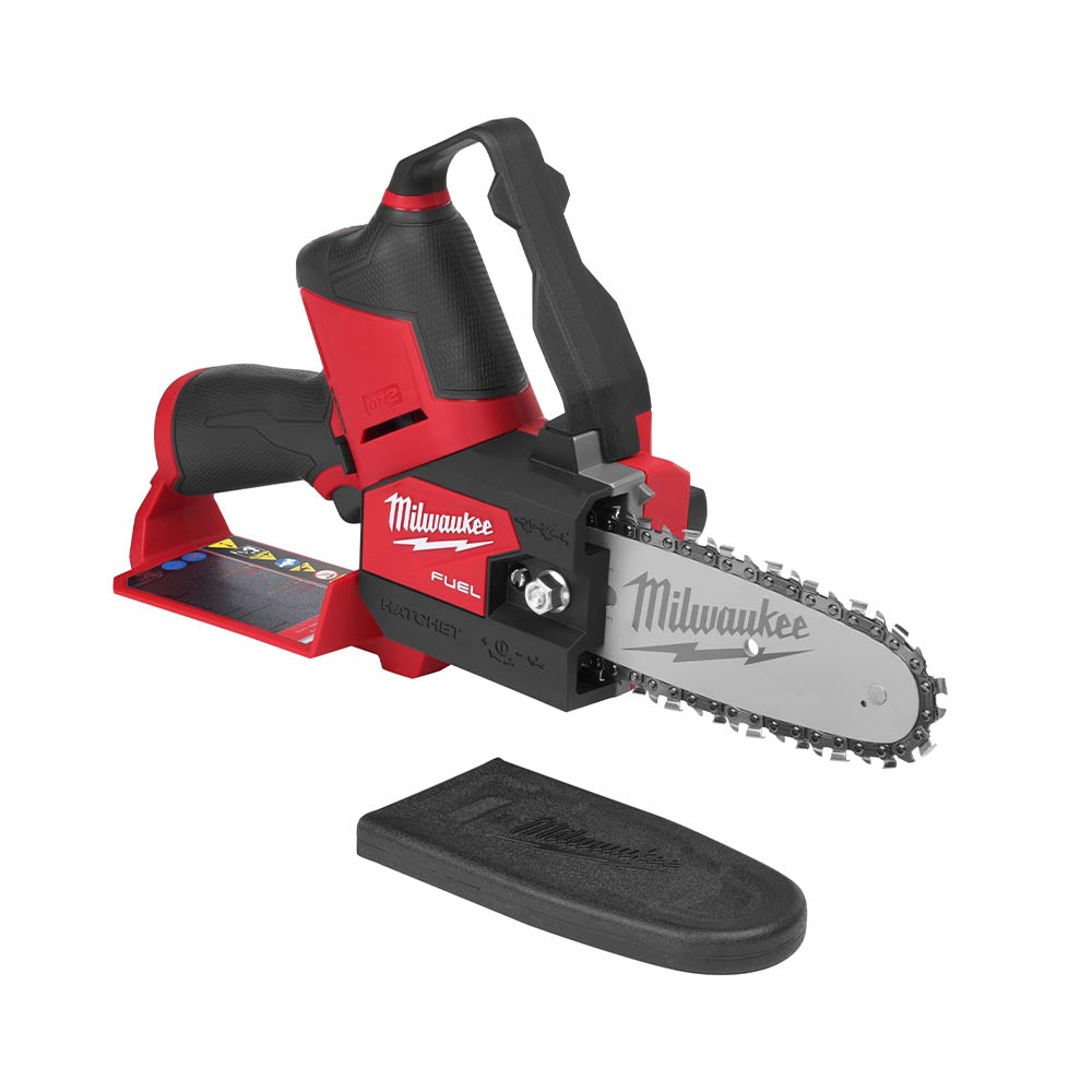 Compact Milwaukee M12 Fuel Hatchet chainsaw with a red body, black handle, and a short silver blade, shown alongside its black protective sheath.