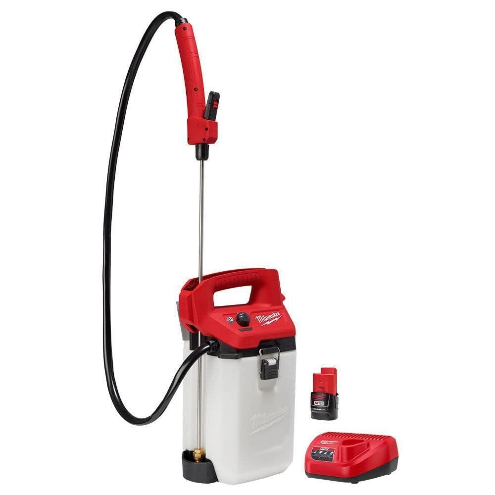 A Milwaukee M12 cordless sprayer kit, featuring a red and white tank with a carrying handle, a long spray wand with a flexible hose, and an included battery with a charger.