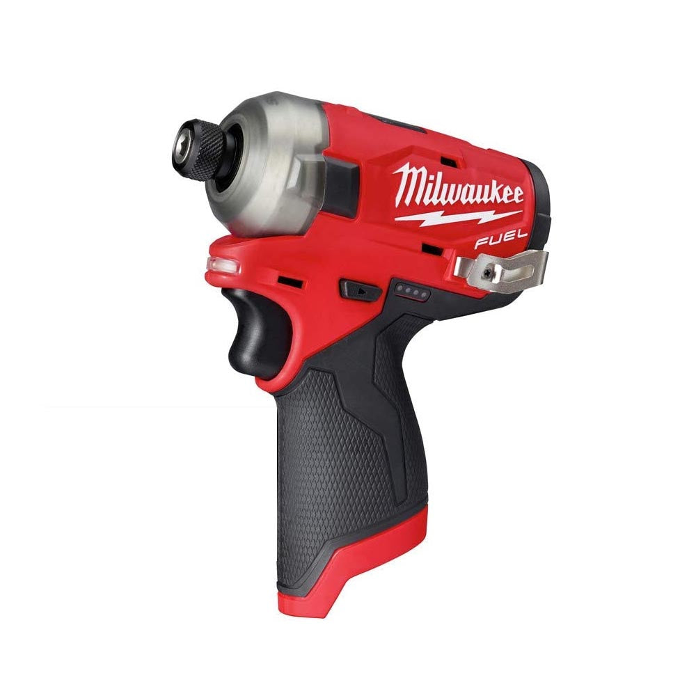 A Milwaukee M12 Fuel cordless impact driver in red and black, featuring a compact design with a textured grip handle and a metal belt clip for easy carrying.