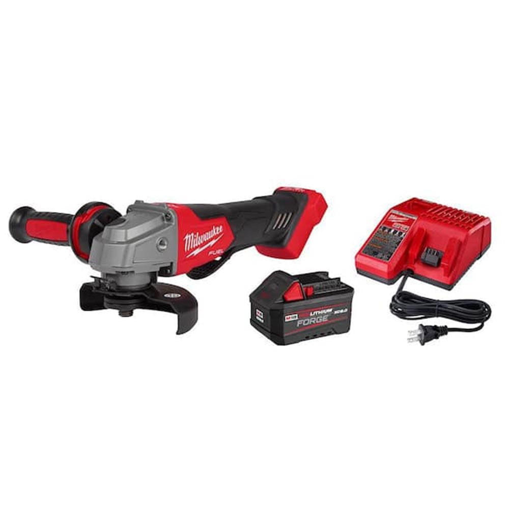 Milwaukee M18 angle grinder with side handle, compact battery, and charger, featuring a sleek design and metal gear housing.