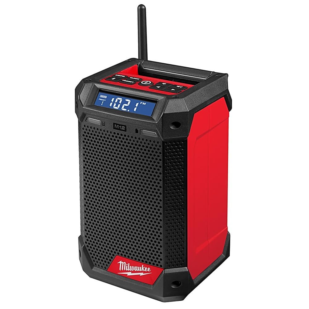 A Milwaukee M12 radio and charger combo in red and black, featuring a digital display, control buttons on top, and a compact design for easy portability.