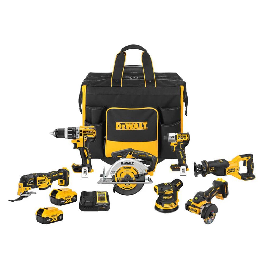 DeWalt power tool set with a drill, impact driver, saws, grinder, sander, batteries, charger, and storage bag.