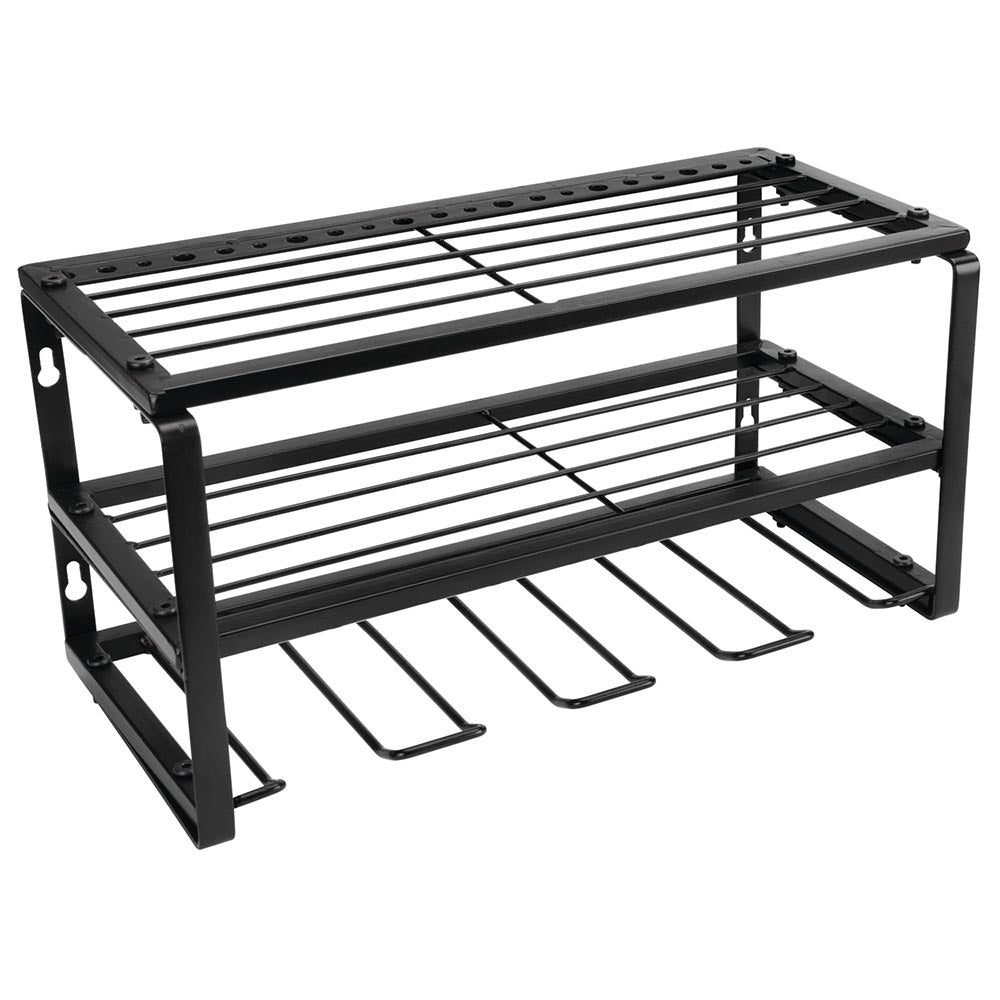 A black metal drill rack designed to be wall-mounted, featuring two shelves with slotted spaces for holding multiple power drills securely.