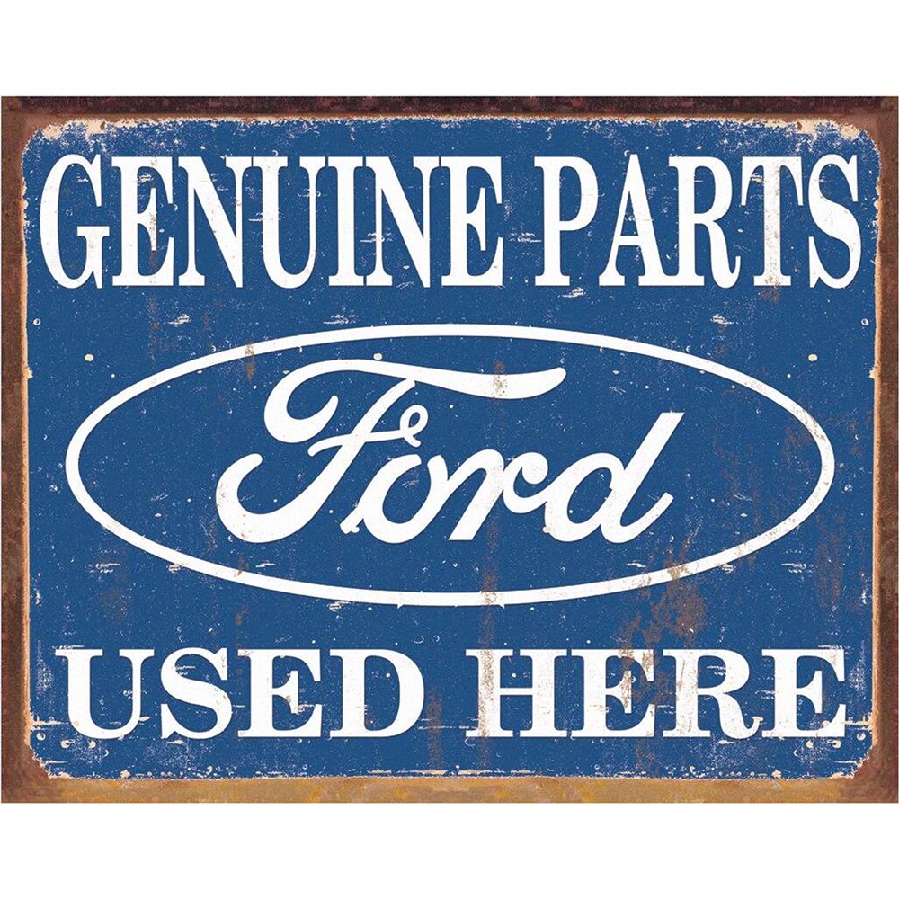 Vintage Ford sign with bold text reading "Genuine Parts Used Here," featuring the classic Ford logo on a distressed background.