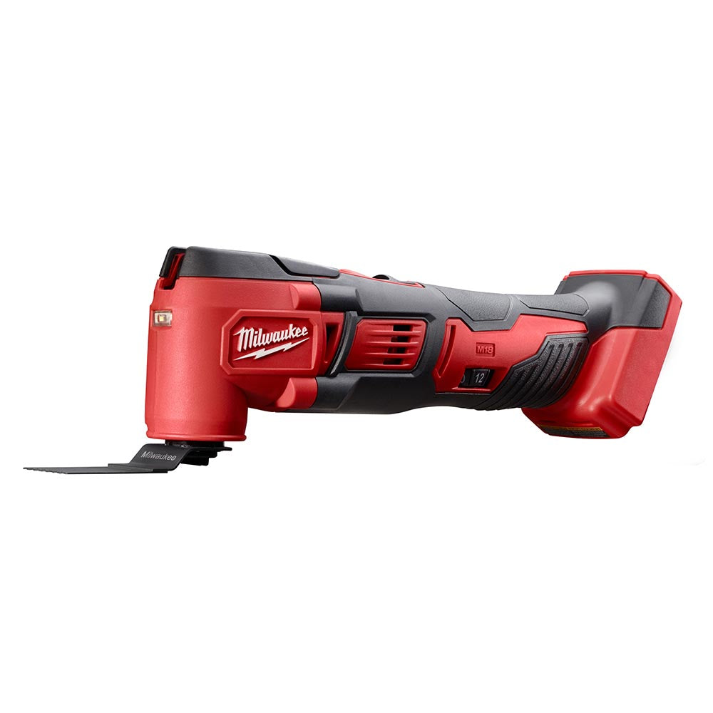 Milwaukee M18 multi-tool designed for versatile cutting, sanding, and scraping tasks, with an ergonomic handle for comfortable use.