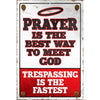 Humorous sign with bold text stating "Prayer is the Best Way to Meet God, Trespassing is the Fastest," featuring a halo graphic.