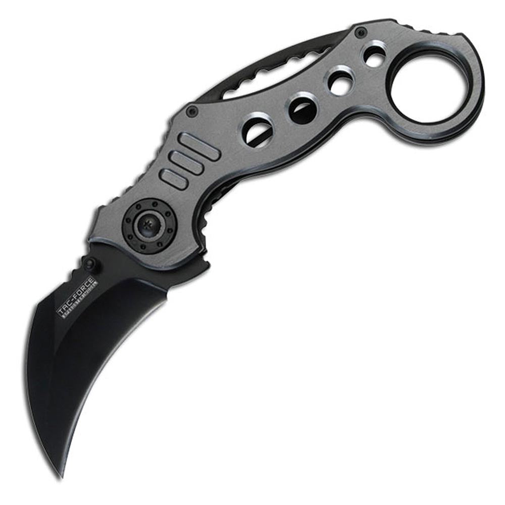 Karambit folding knife with a curved black blade, ergonomic handle featuring multiple cutouts, and a finger ring.