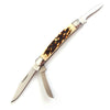 Classic pocket knife with three stainless steel blades, a textured handle with a faux stag design, and polished bolsters.